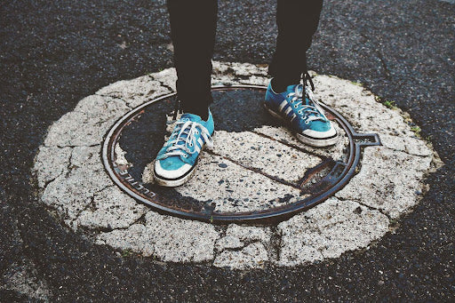 The Interesting Reason Why Manhole Covers Are on the Road